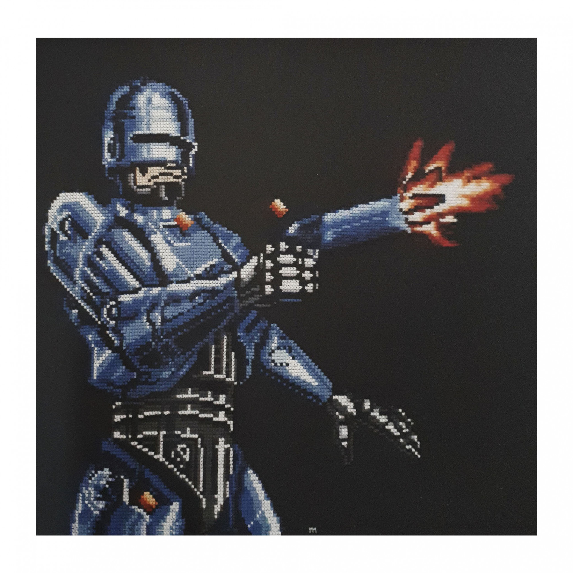  / Cross-stitch embroidery from *Robocop 2* video game, Ocean Software, on NES. Art by artist Marine Beaufils.